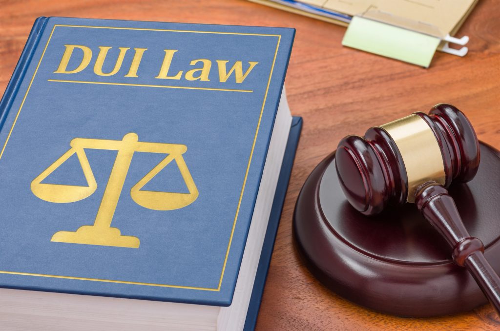 Book and gavel. The book says 'DUI Law'