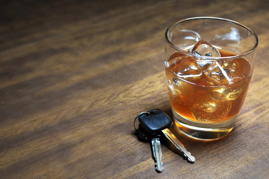 Alcoholic drink near a set of car keys