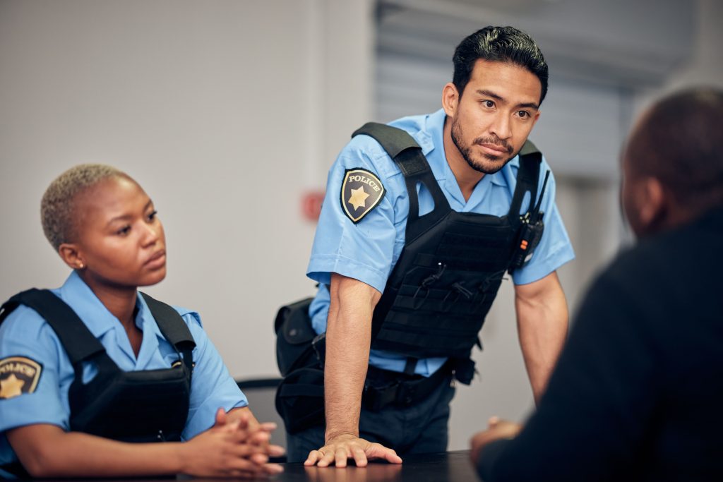 interrogation-arrest-and-police-team-with-a-suspe-2023-11-27-04-51-56-utc