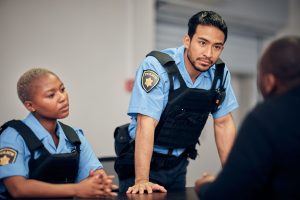 interrogation-arrest-and-police-team-with-a-suspe-2023-11-27-04-51-56-utc