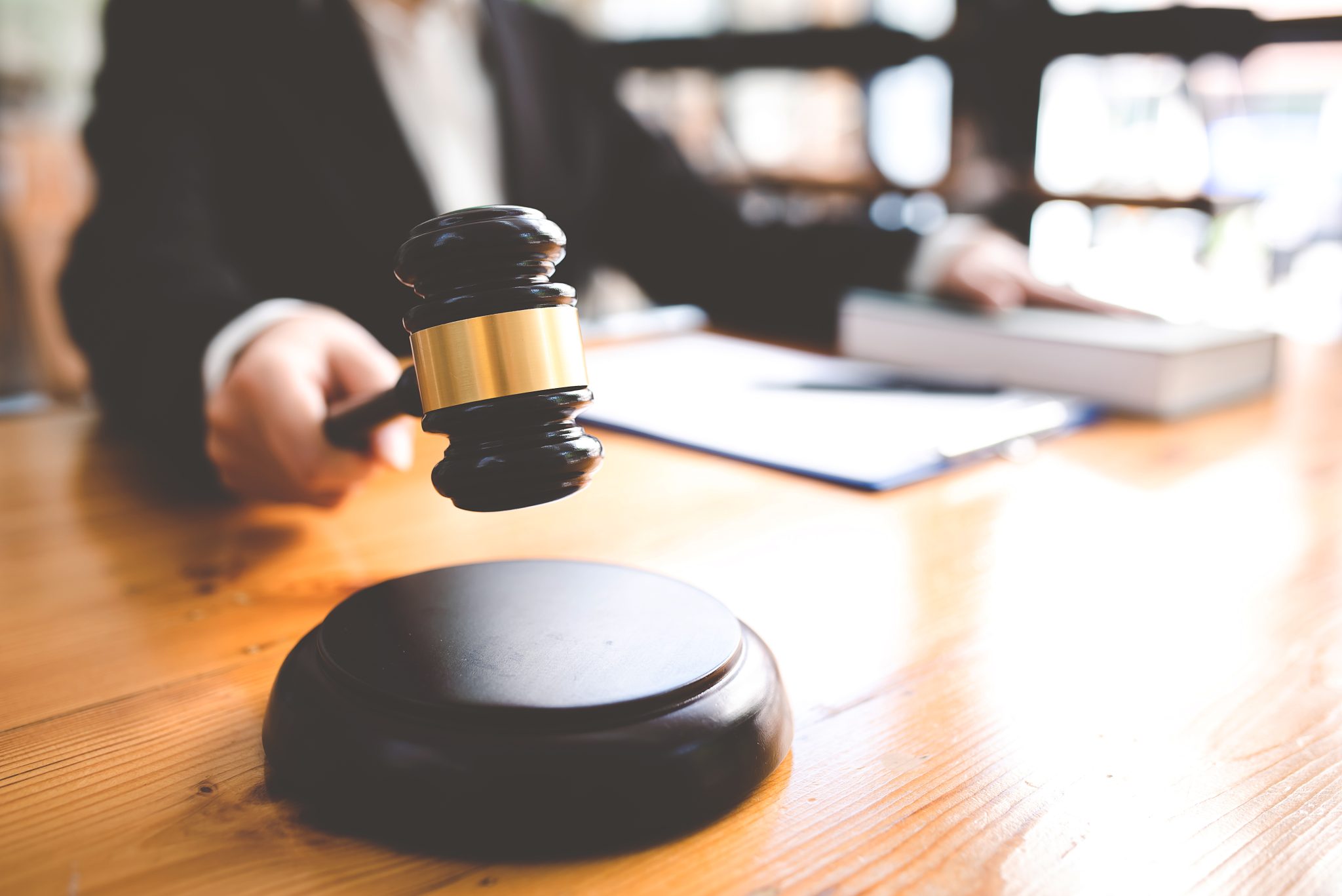 judge with hammer lawyer justice a businessman in a suit or a lawyer working on paperwork Legal concepts, advice and justice