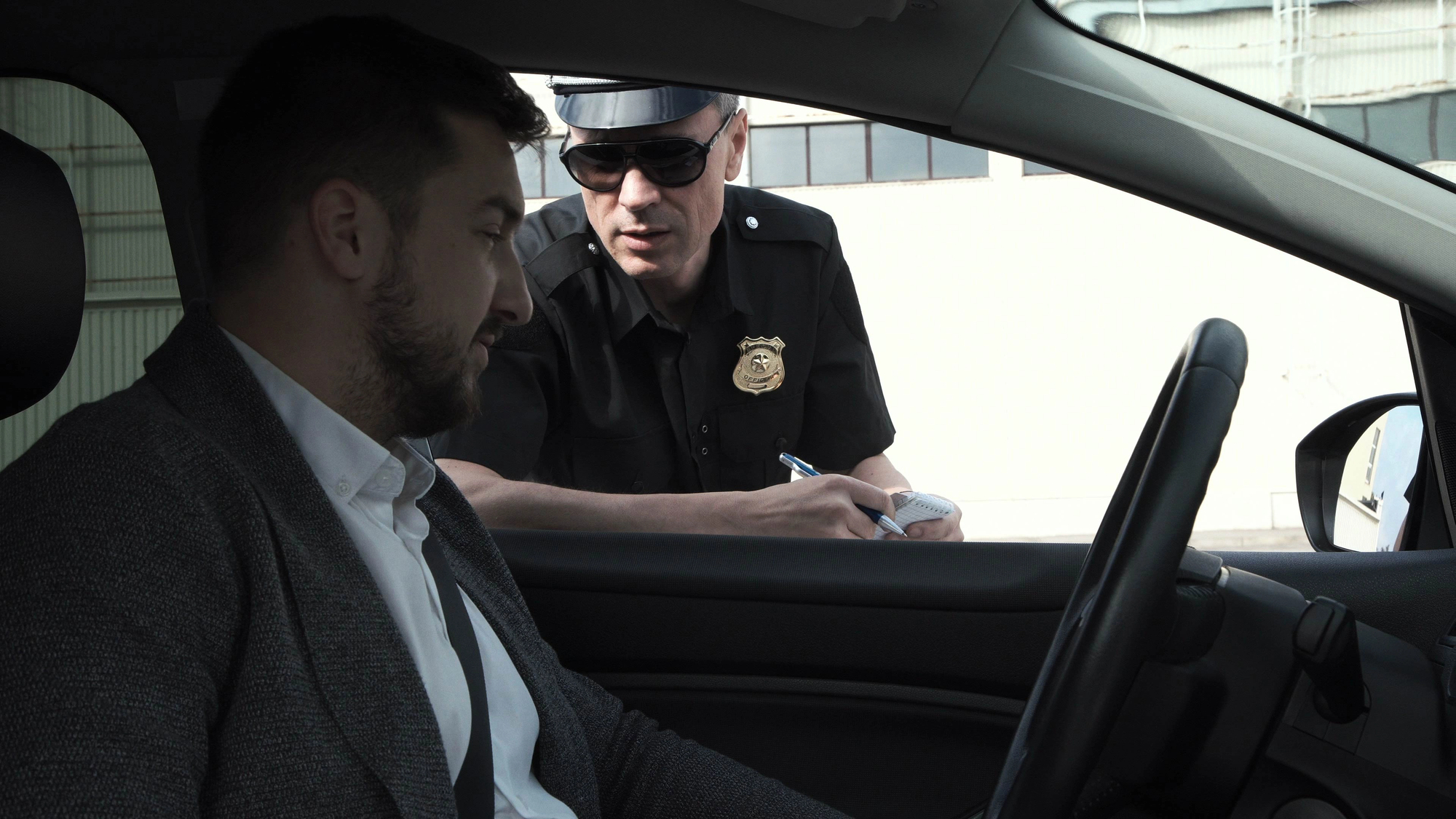 police officer talking to driver